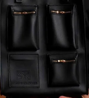 Studio detail of the DK 01 Moscow front pockets and their metal zip pulls.